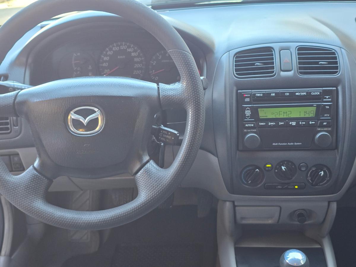 mazda-323-2003-gasolina-1324cc